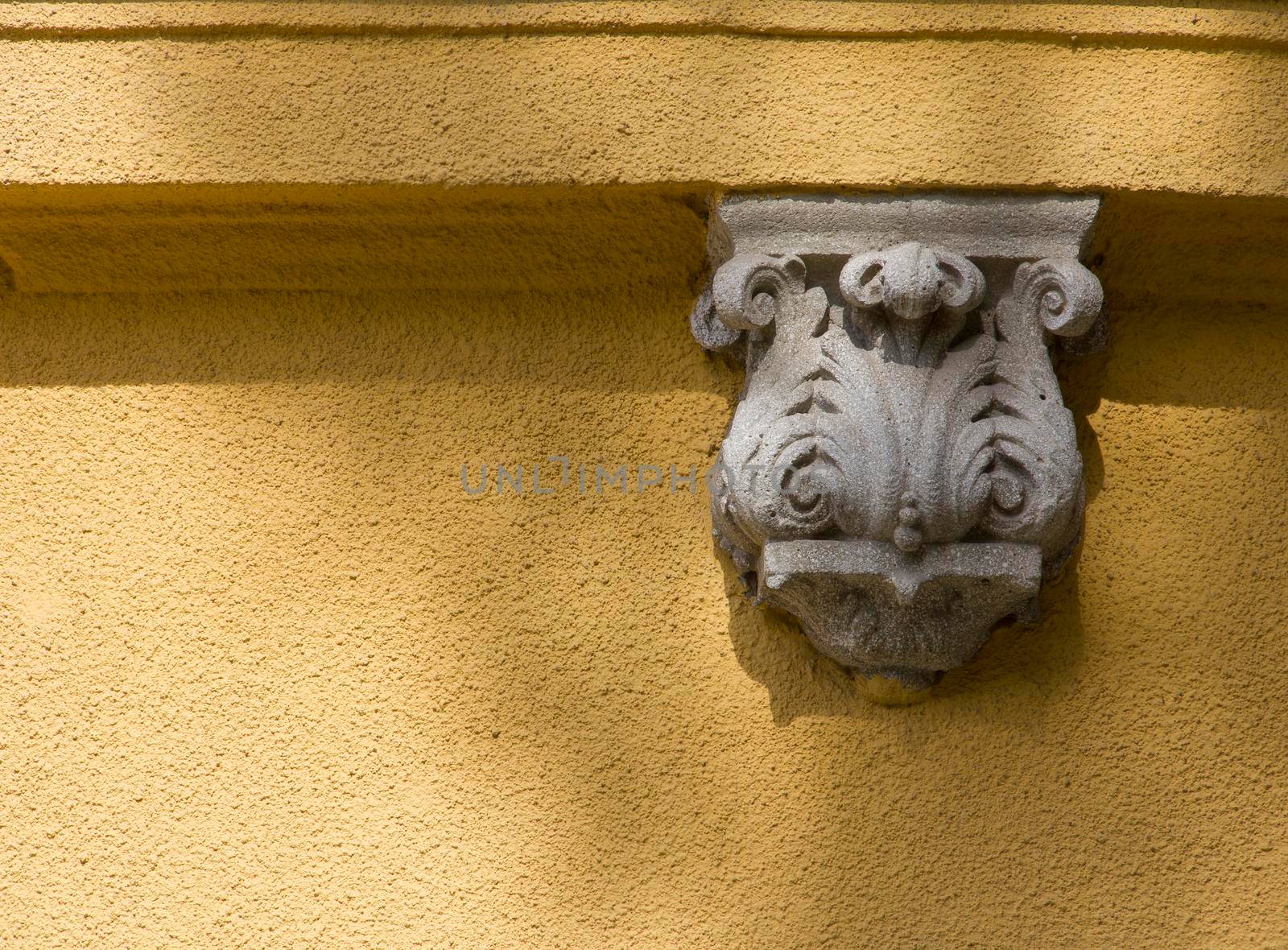 Yellow cold wall gray stone ornament. High quality photo