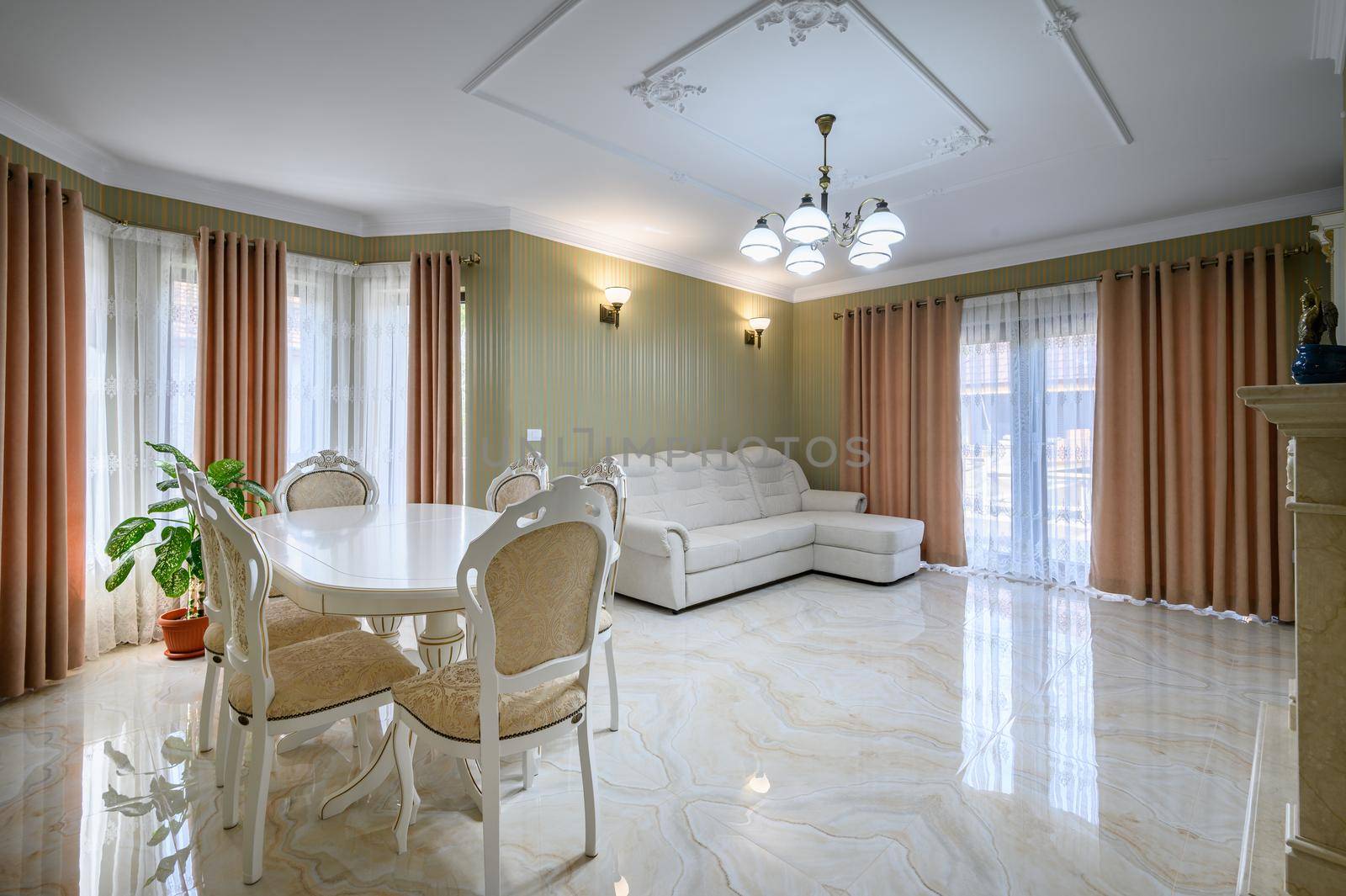 Classic living room interior design. Spacious room, luxury marble floor, elegant chairs and accessories