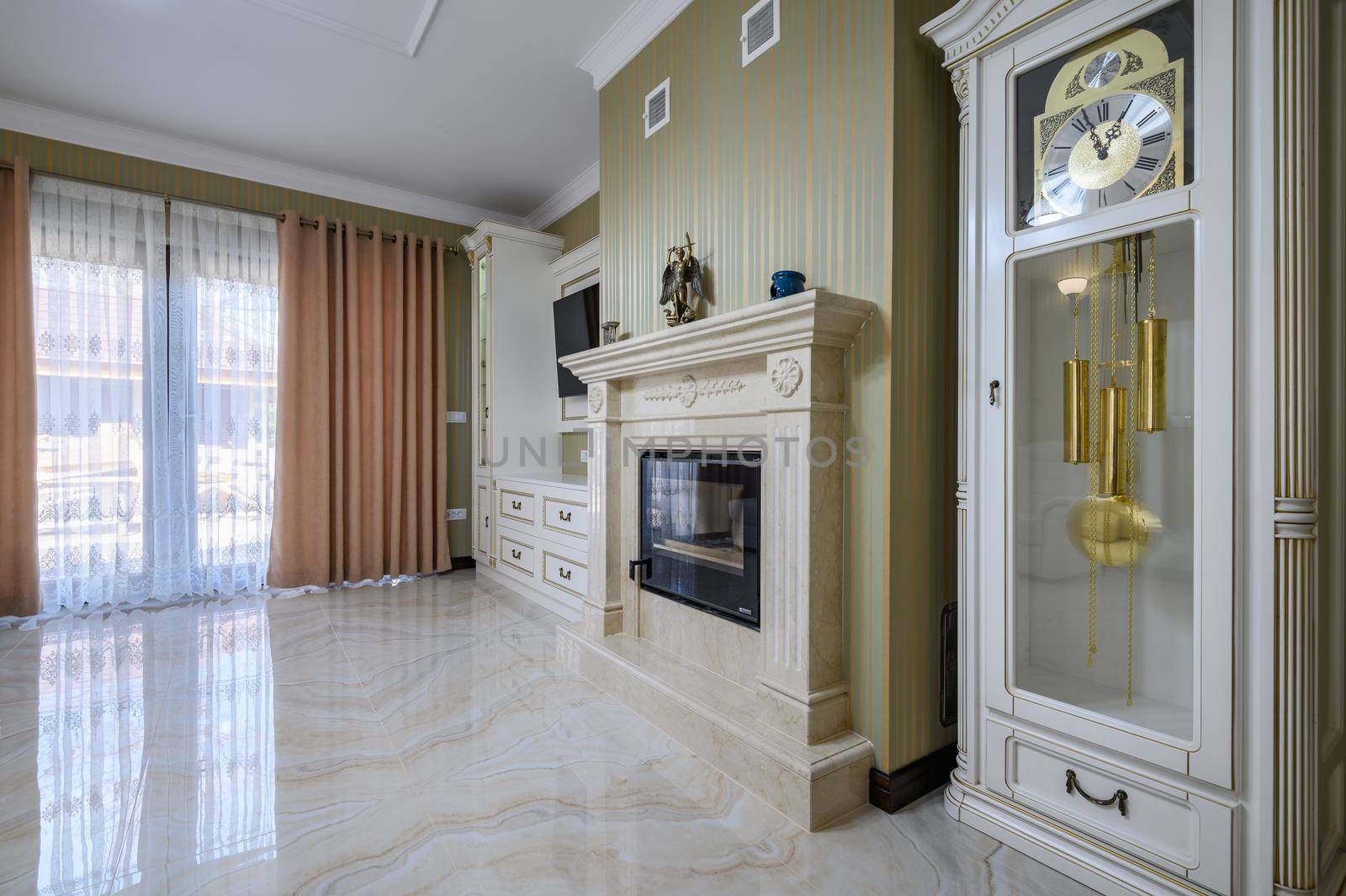 Classic living room interior design. Spacious room, luxury marble floor, elegant chairs and even fireplace