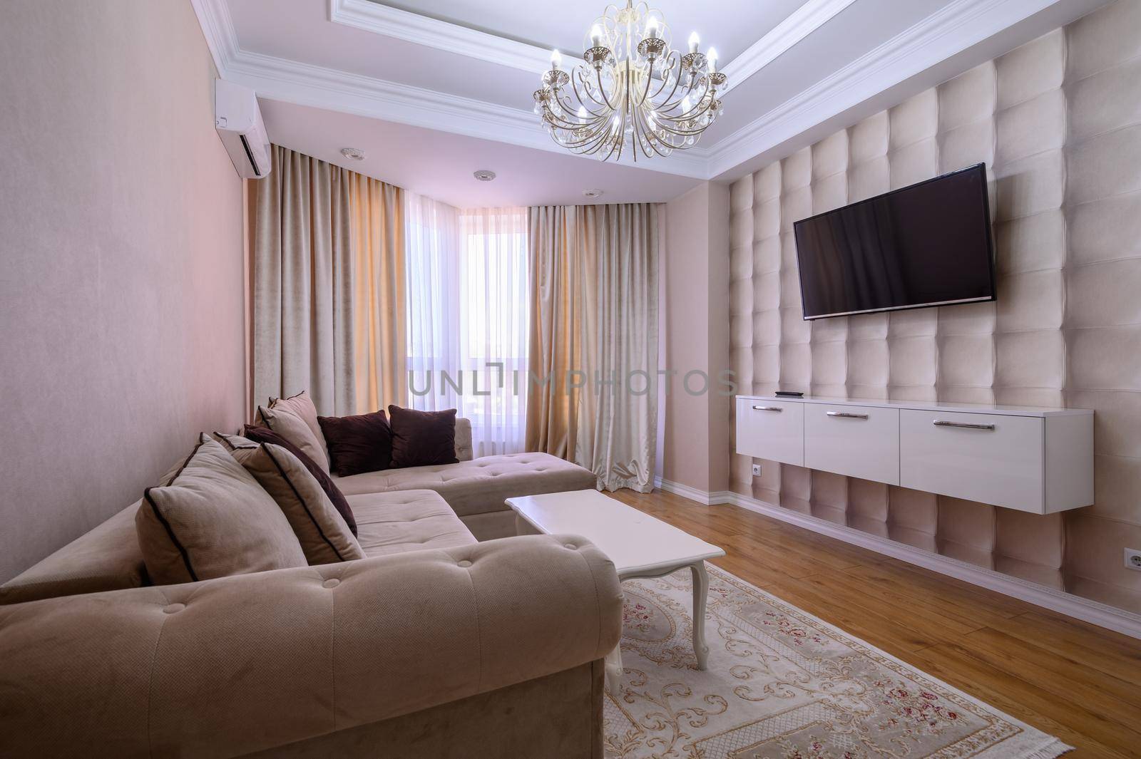 Luxury white and pink modern studio apartment interior with dining area, living area and bedroom