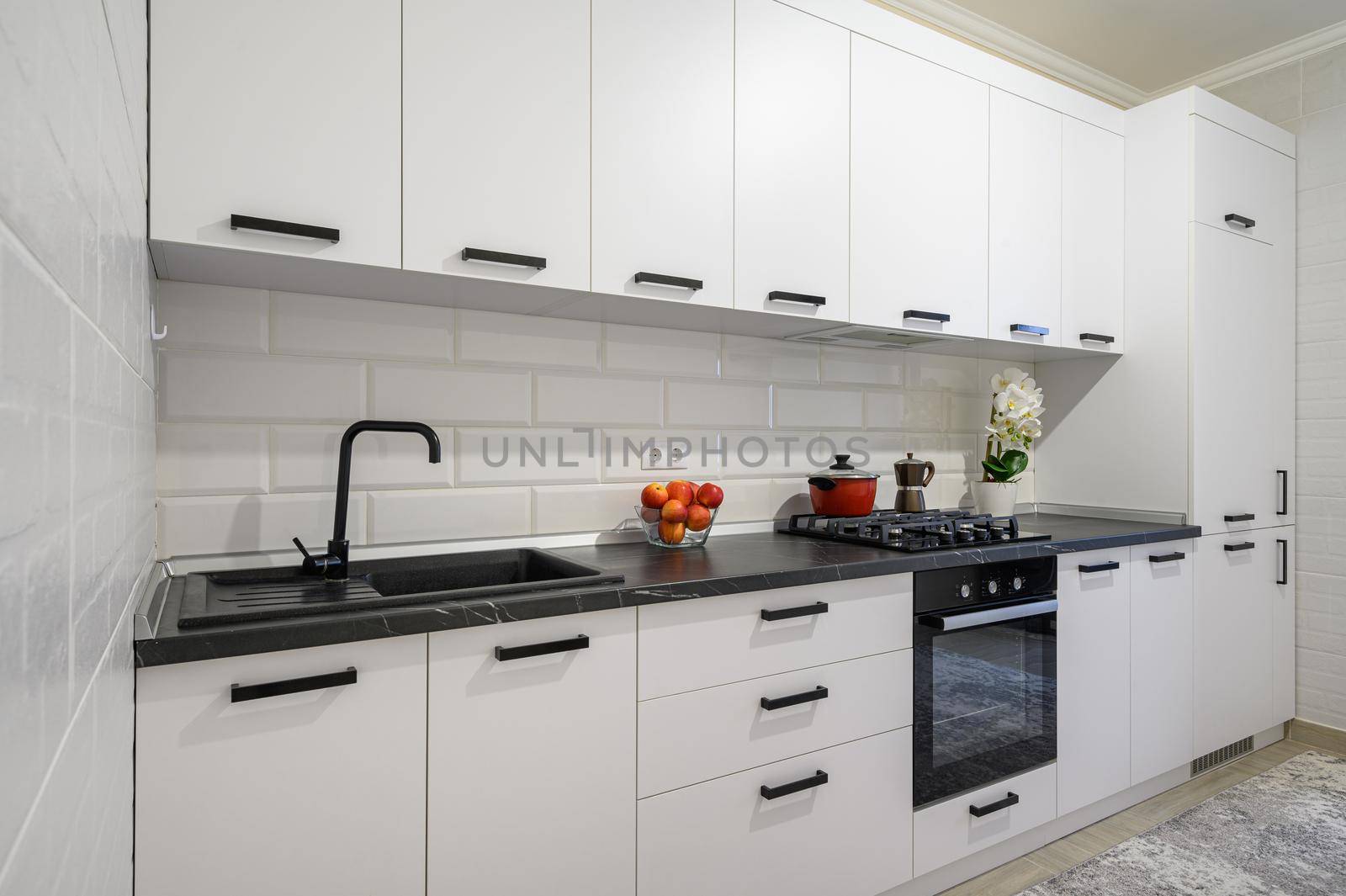 Trendy snow white modern kitchen interior showcase with minimalistic furniture