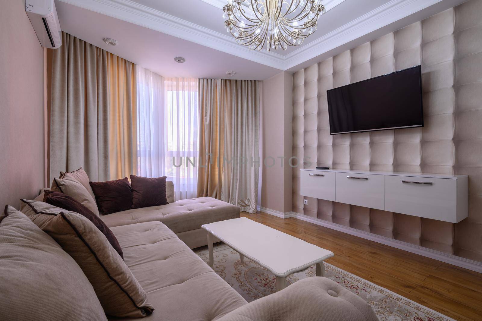 Luxury white and pink modern studio apartment interior with dining area, living area and bedroom