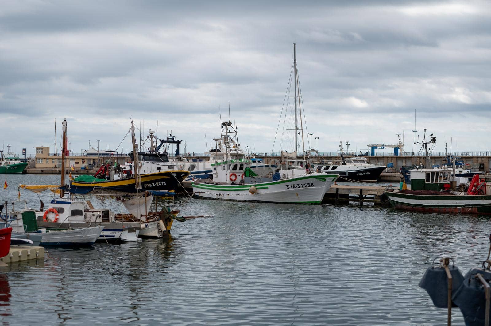 Cambrils, Spain : 2022 September 10 : Boats on the docks of the port of Cambril in the summer of 2022.