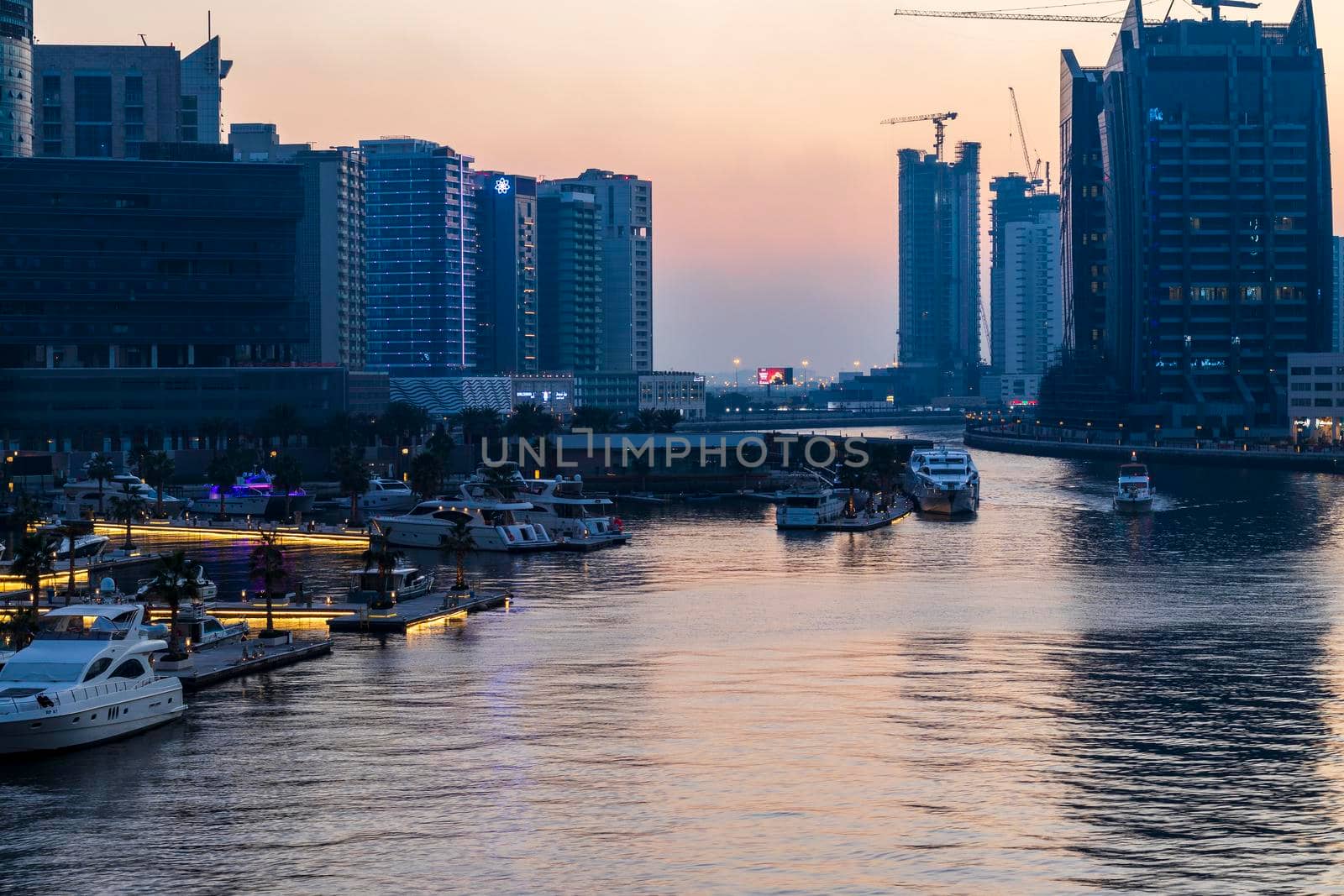 Dubai, UAE - 02.12.2021 Evening hour at Dubai water canal. Outdoors by pazemin