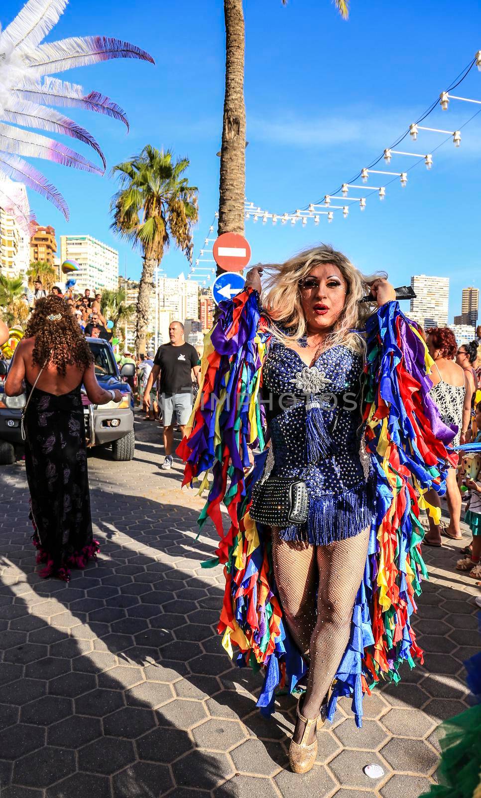 People dancing and having fun at the Gay Pride Parade in Benidorm by soniabonet