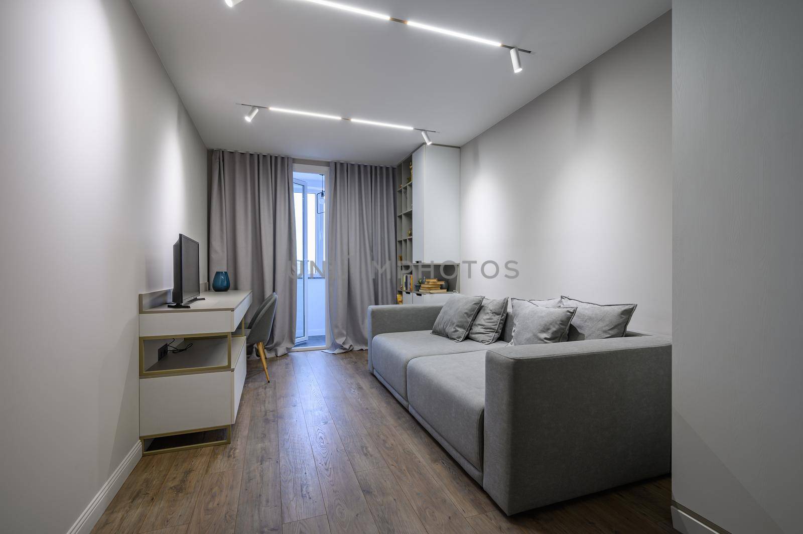 Cozy and luxury bedroom in shades of grey with elegant and modern details