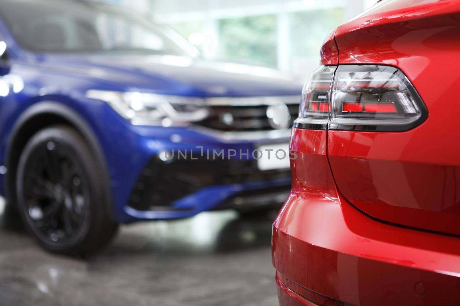 Unrecognisable new cars at dealership by MAD_Production