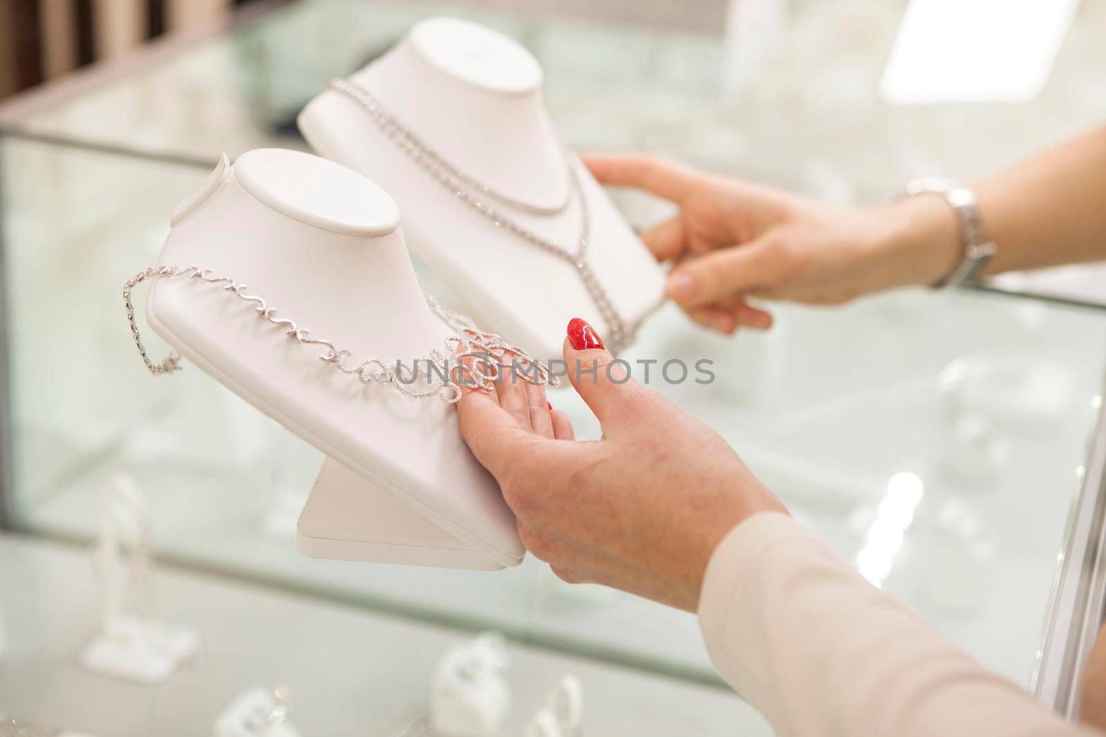 Women buying jewelry at the boutique by MAD_Production