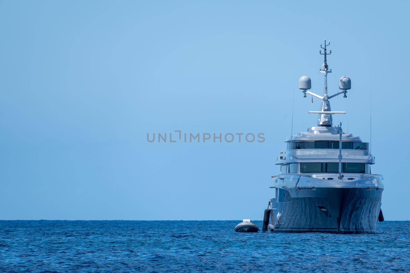 Grey yacht anchored in Formentera