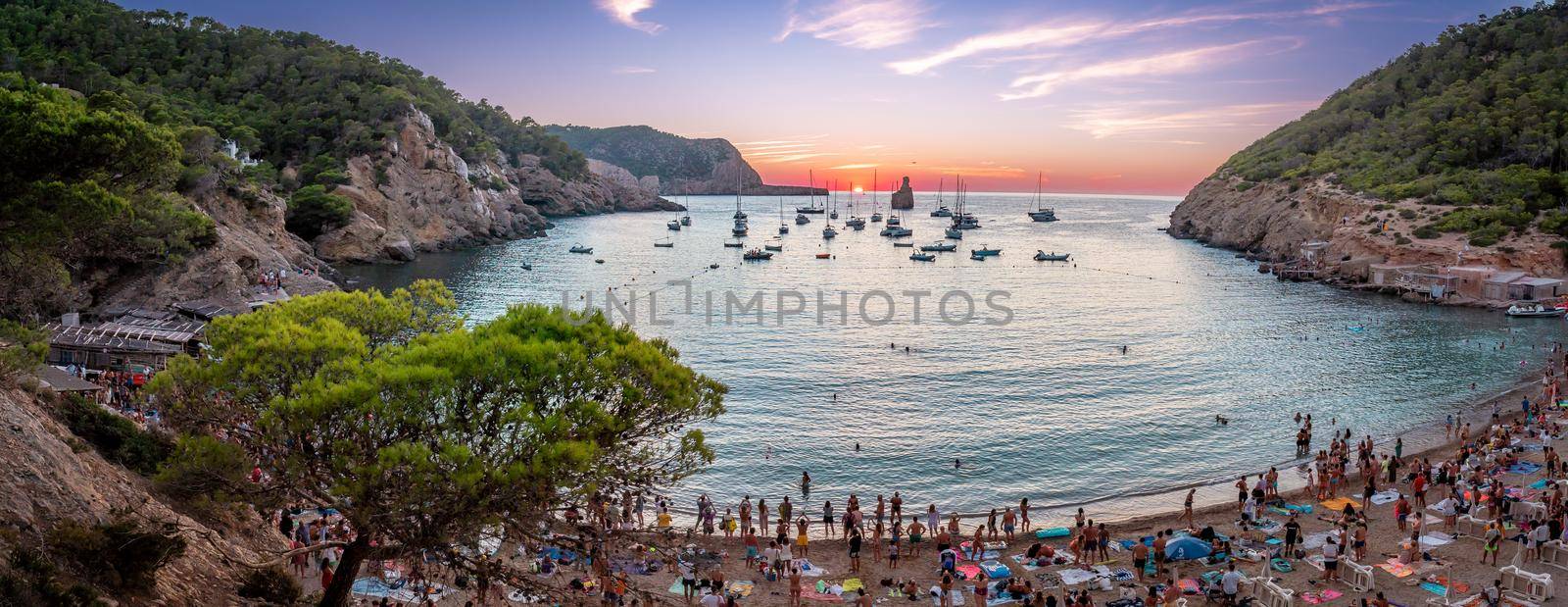 Panoramic view of a sunset in Cala Benirras by LopezPastor