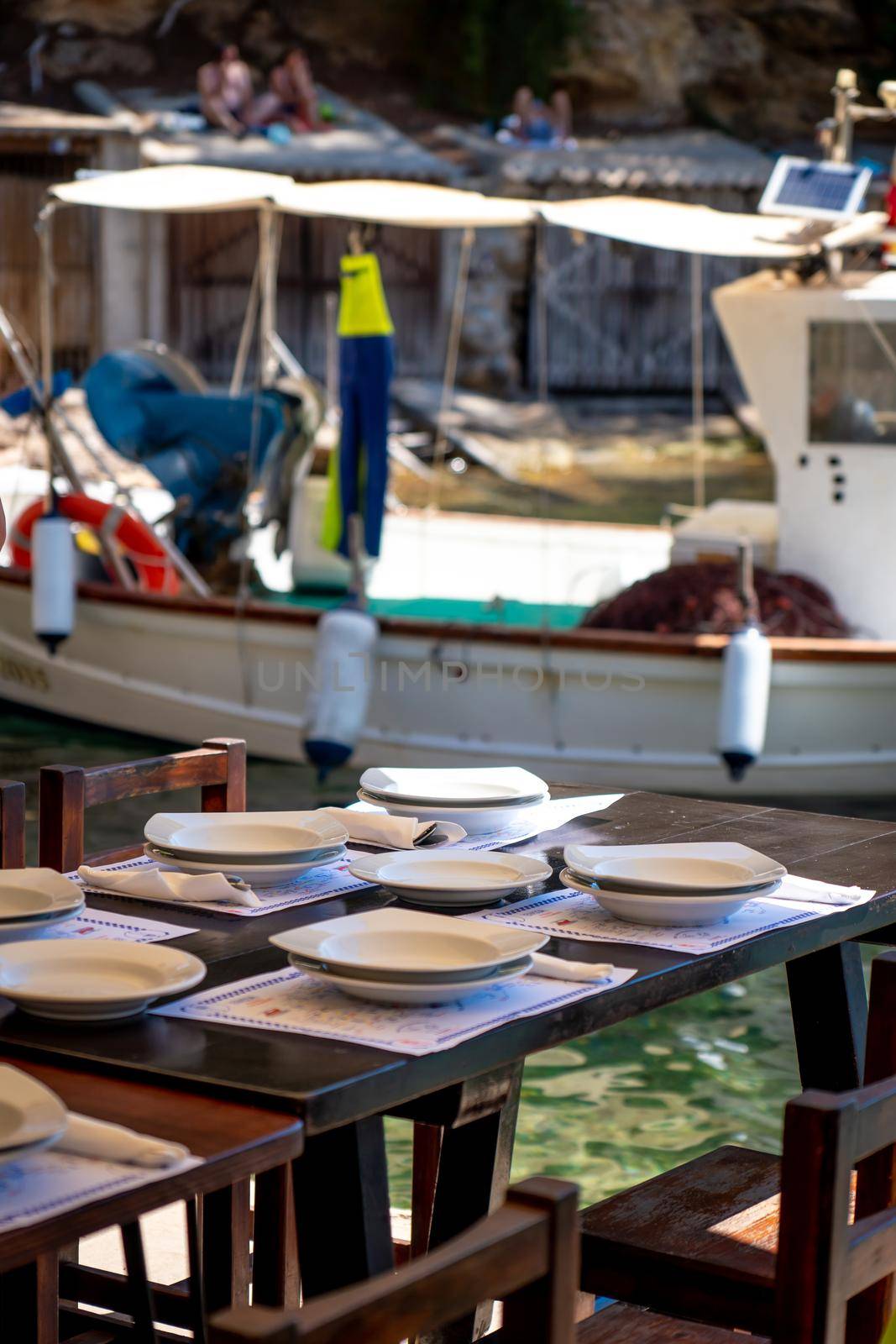 Table prepared in El Bigotes restaurant by the Mediterranean Sea