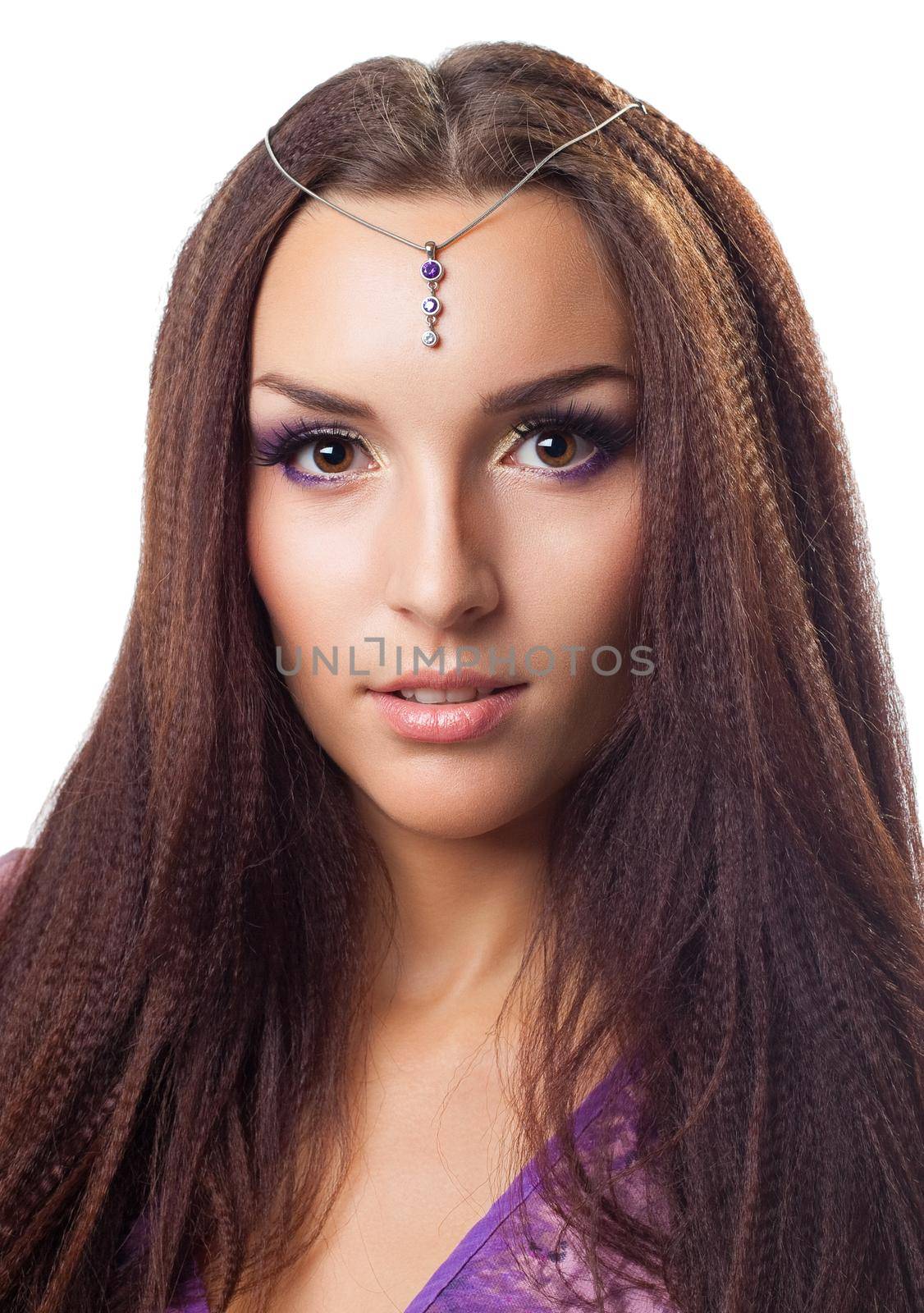 Beautiful young woman portrait with long hairs and jewel on forehead