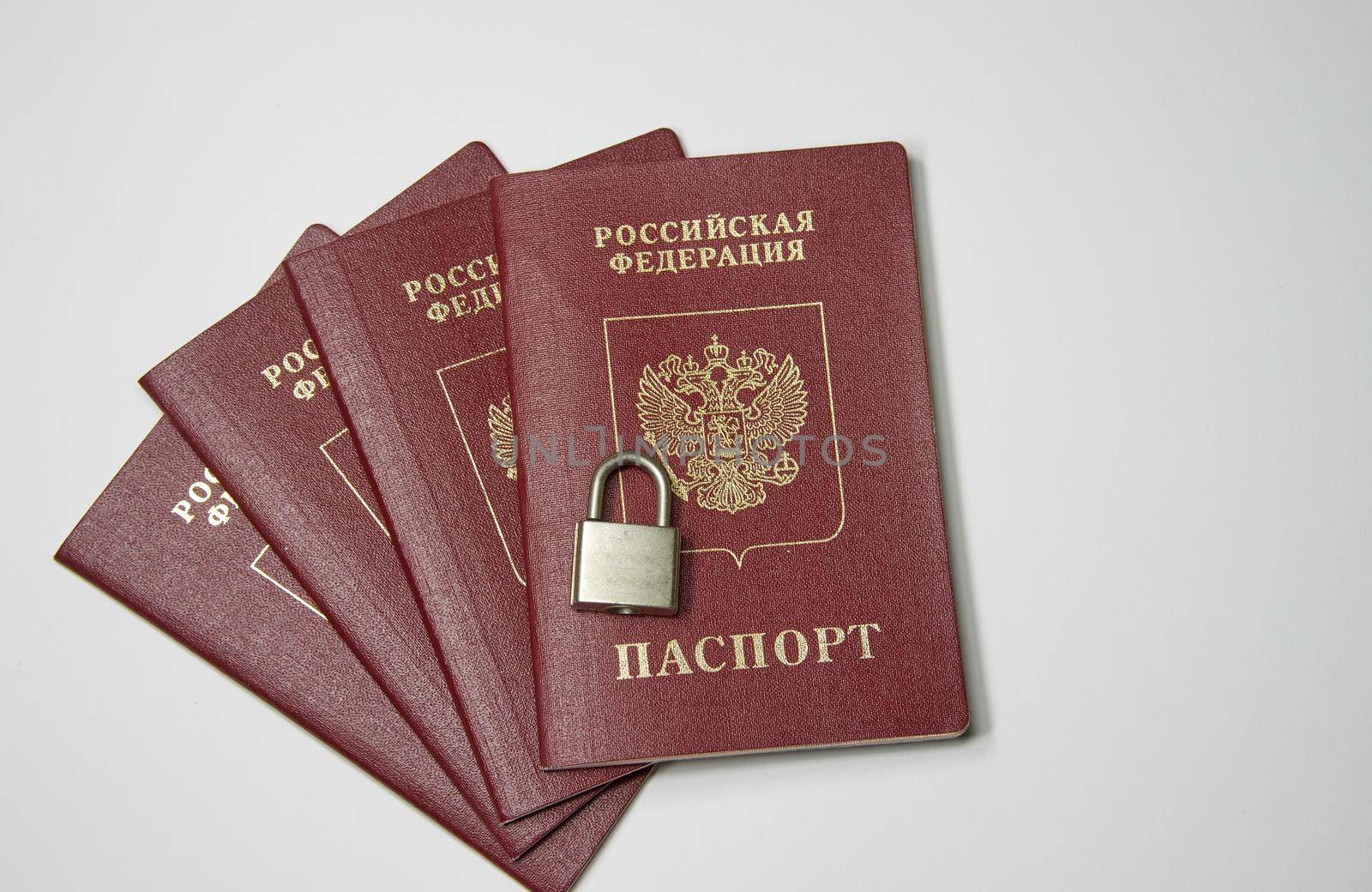 ban on leaving Russia, passports under lock and key.