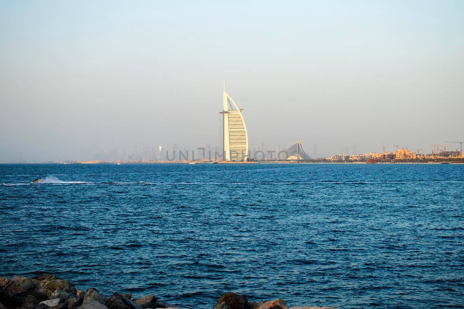 Dubai city skyline before the sunset. View from Palm Jumeirah. by pazemin