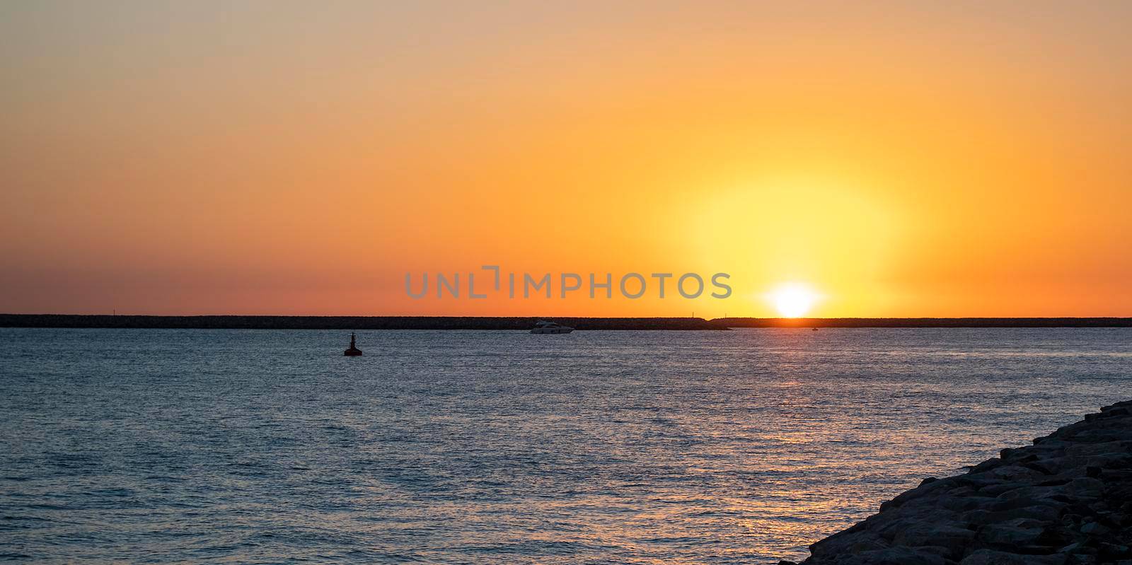 Beautiful sunset captured on Palm Jumeirah, Dubai, world's only man made island. Dubai, UAE. Outdoors