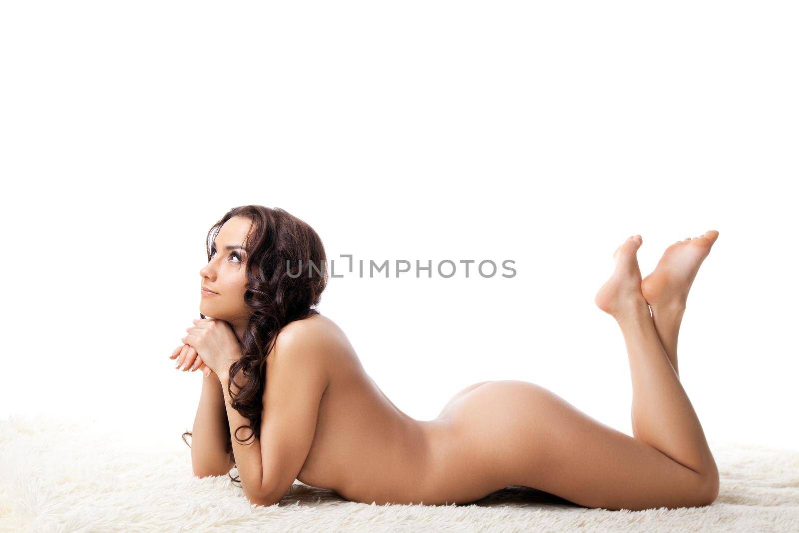 Cute naked woman lay on white by rivertime