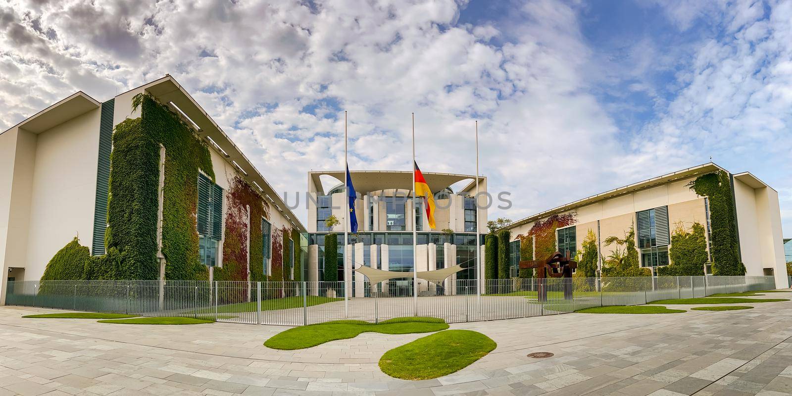 Panorama of Olaf Scholz chancellery in Berlin with EU flag and German flag, Berlin, Germany