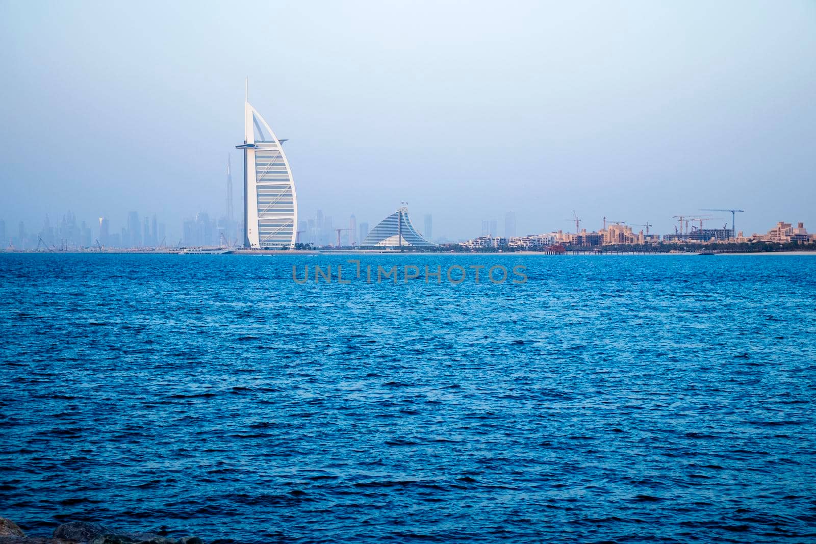 Dubai city skyline before the sunset. View from Palm Jumeirah. by pazemin