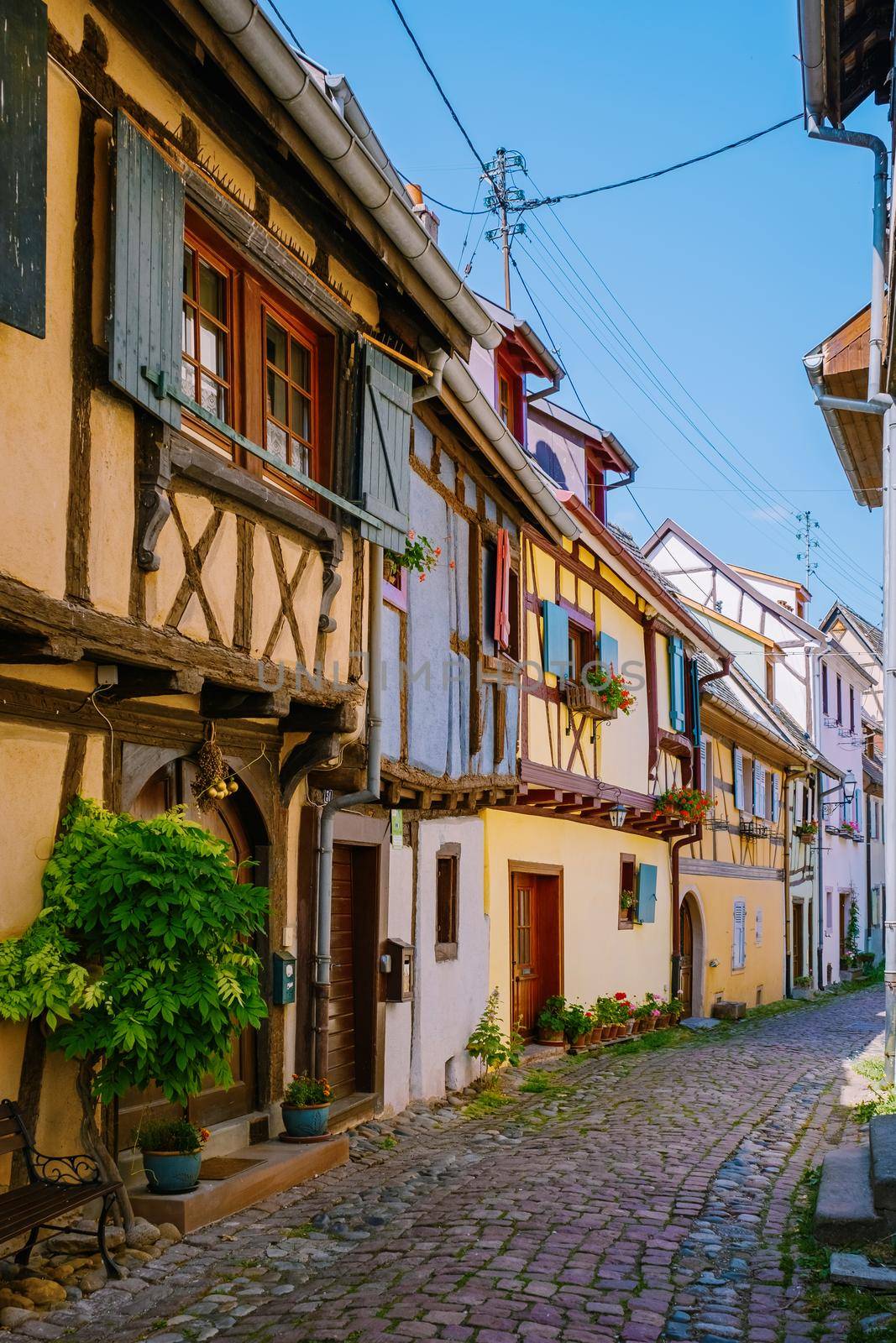 Eguisheim, Alsace, France, Traditional colorful halt-timbered houses in Eguisheim Old Town on Alsace Wine Route, France.colorful streets old town