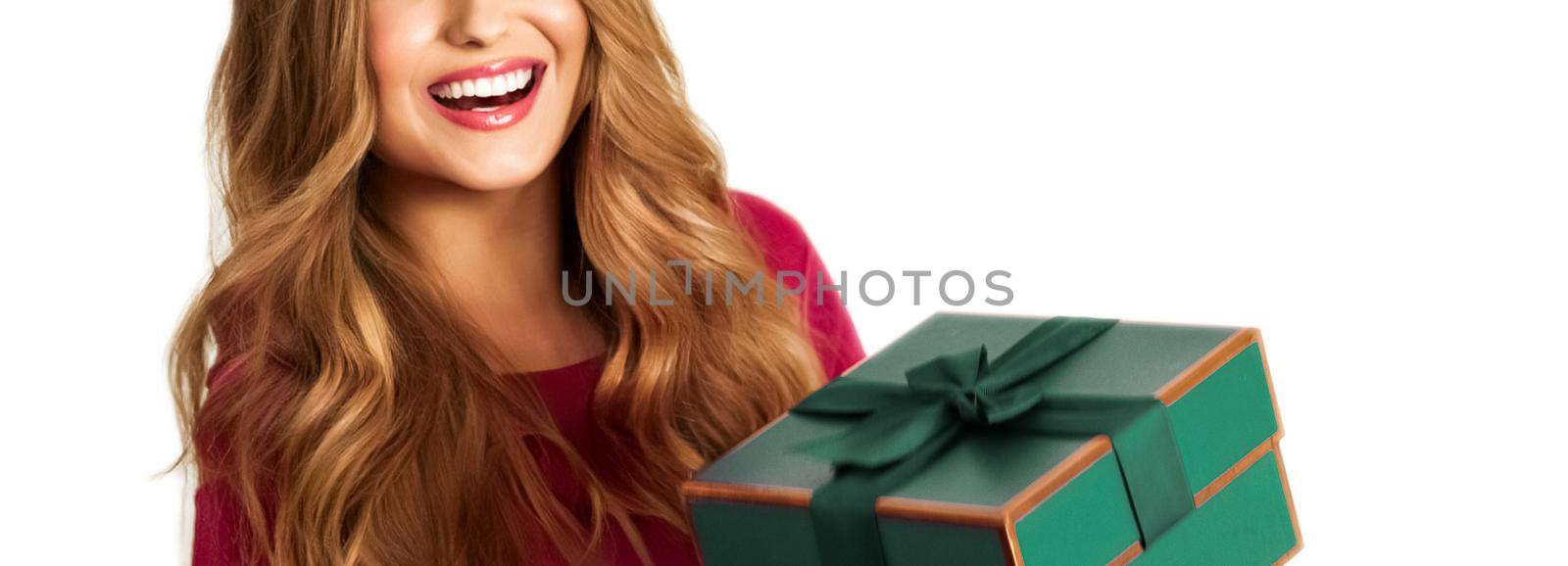 Birthday, Christmas or holiday present, happy woman holding a green gift or luxury beauty box subscription delivery isolated on white background by Anneleven