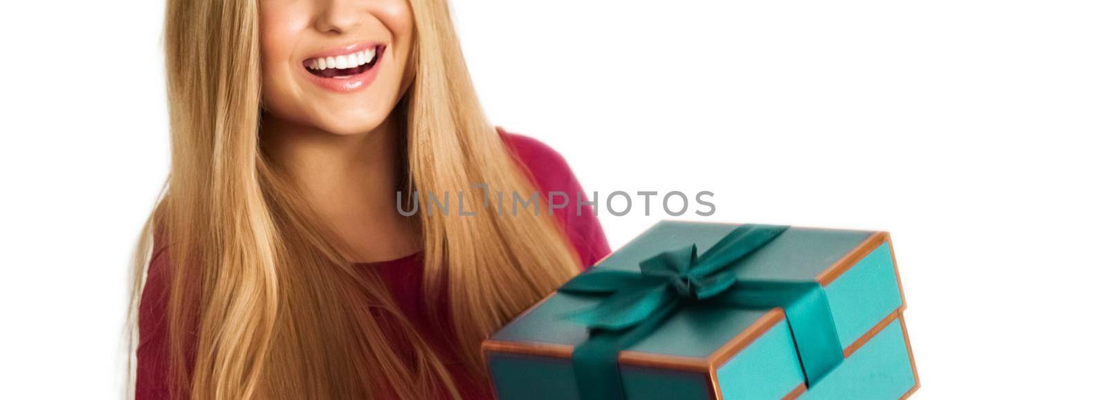 Birthday, Christmas or holiday present, happy woman holding a green gift or luxury beauty box subscription delivery isolated on white background by Anneleven