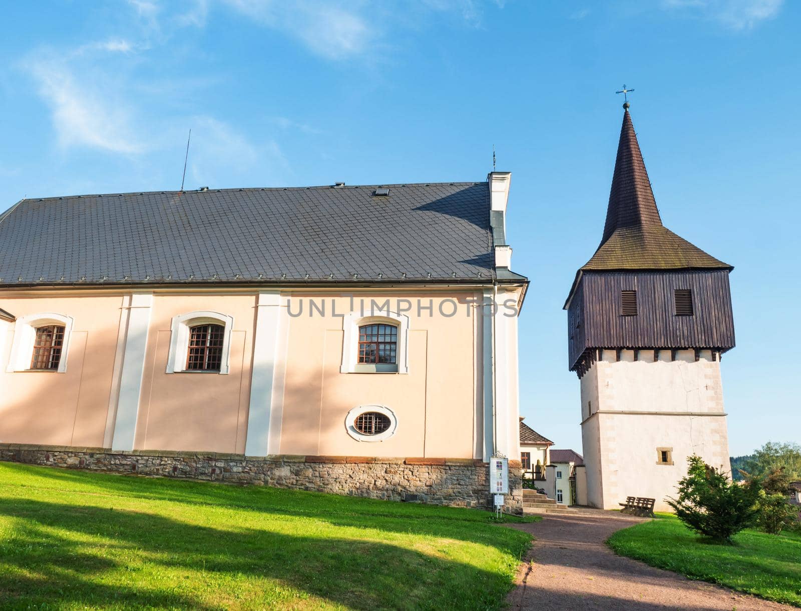 Wooden renaissance bell tower at the Church of All Saints was built in 1610 on hill above Hronov town, Czechia.