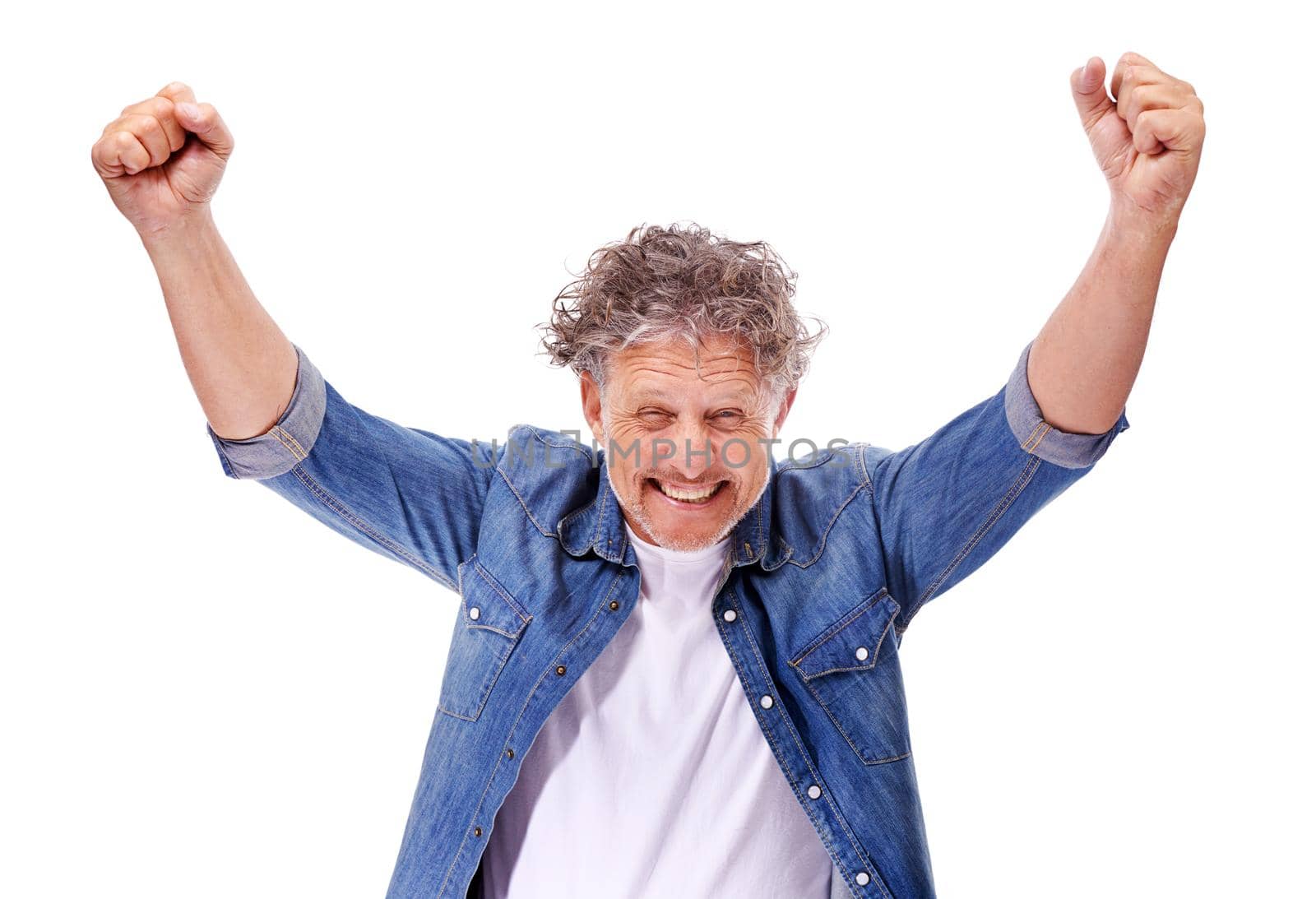 Feeling like a winner. Studio shot of an enthusiastic mature man with his arms raised isolated on white. by YuriArcurs