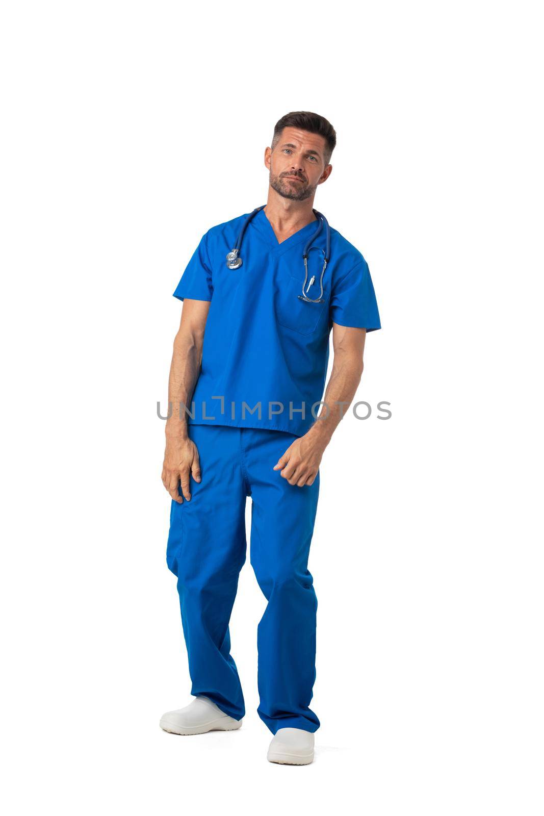 Tired sleepy doctor standing in medical clothing with eyes closed full length portrait isolated on white background