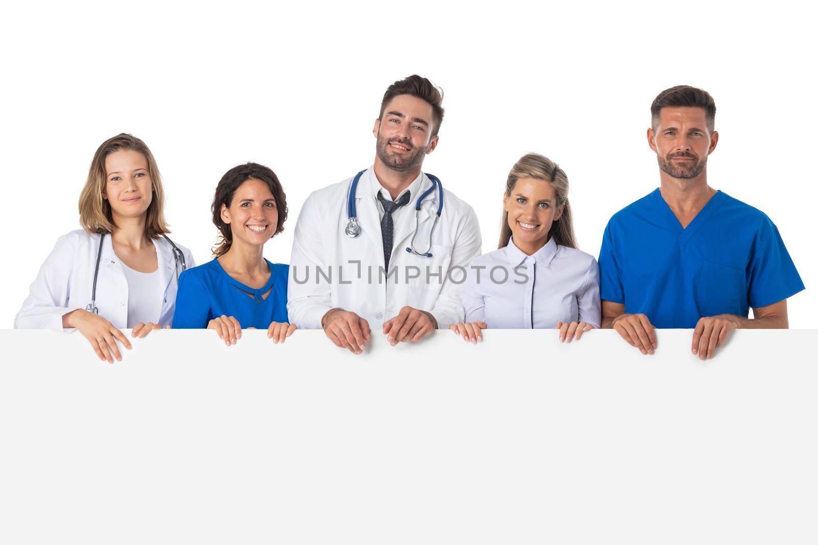 Portrait of confident medical team holding blank billboard isolated on white background, copy space for text