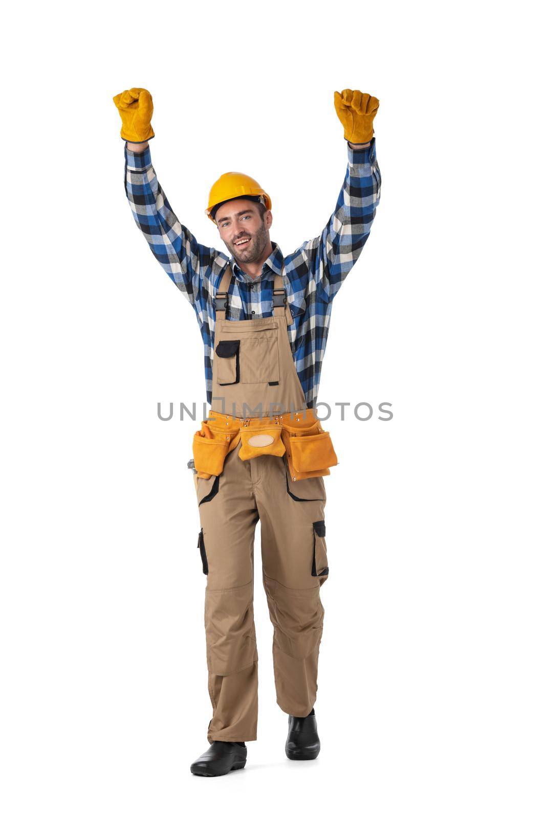 Happy construction worker with arms raised by ALotOfPeople