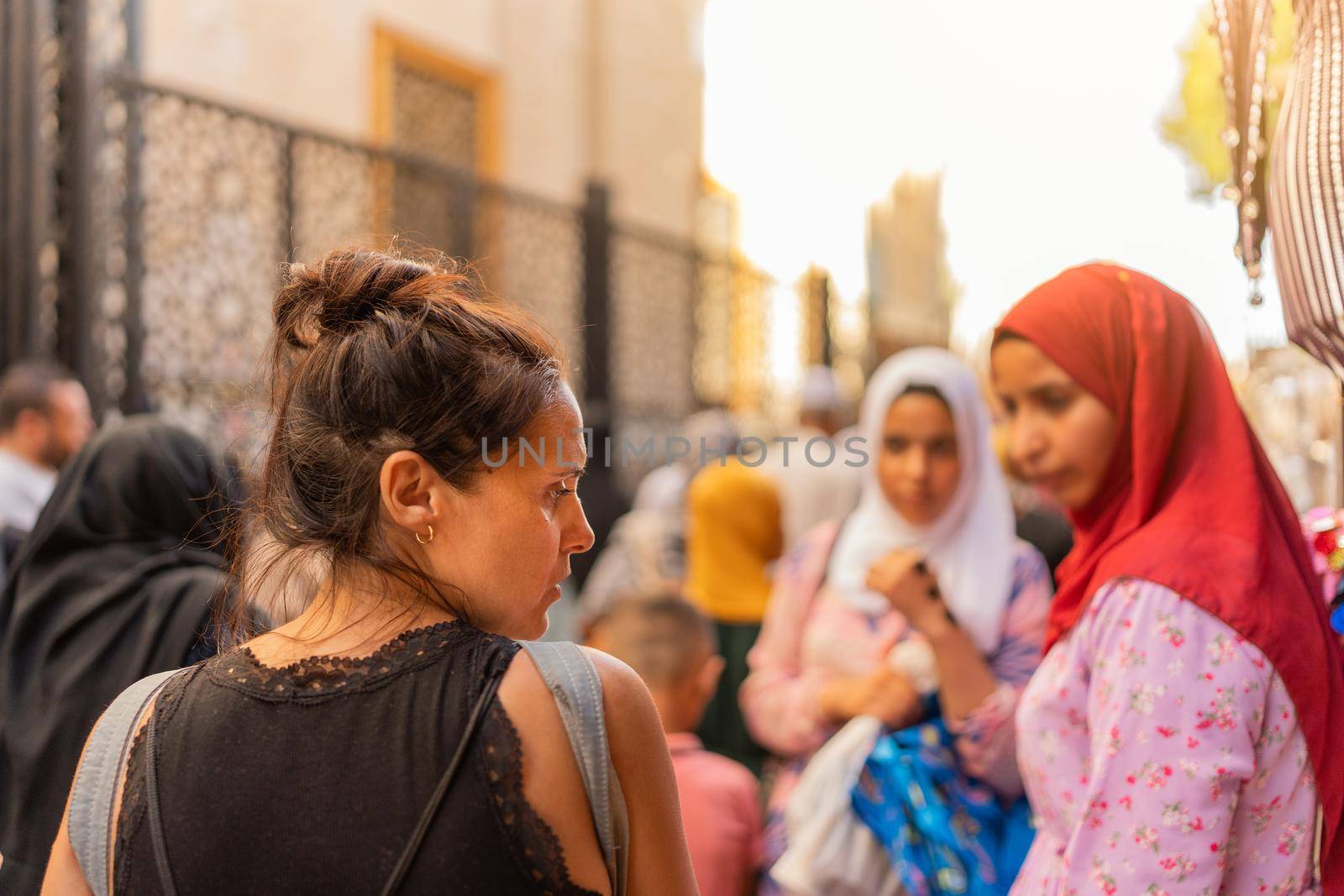 Caucasian tourist in the street of Cairo City in Egypt by ivanmoreno