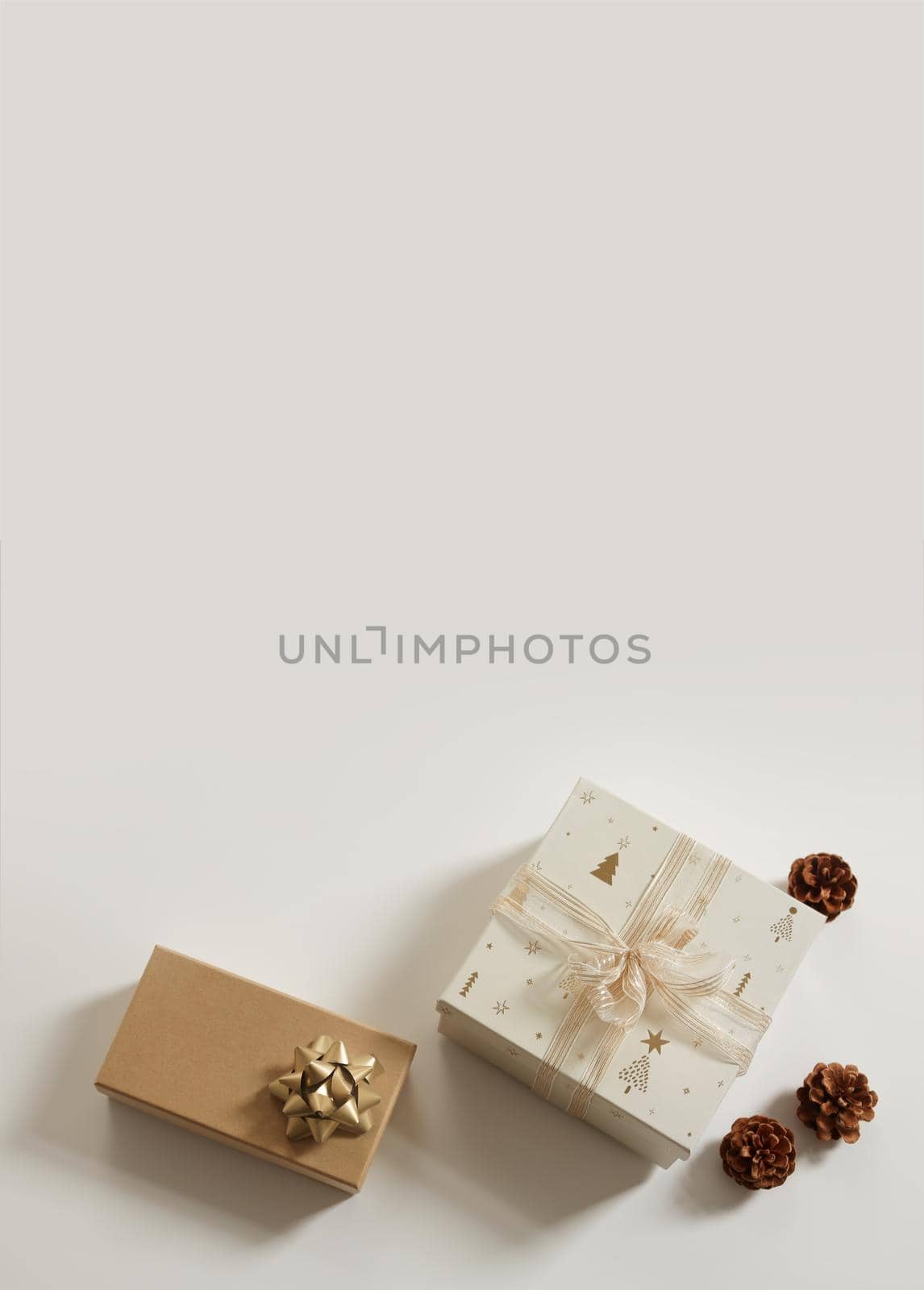 Christmas composition. Xmas background. Christmas gift, pine cones on the white background. Free space for text, copy space. Flat lay, top view.