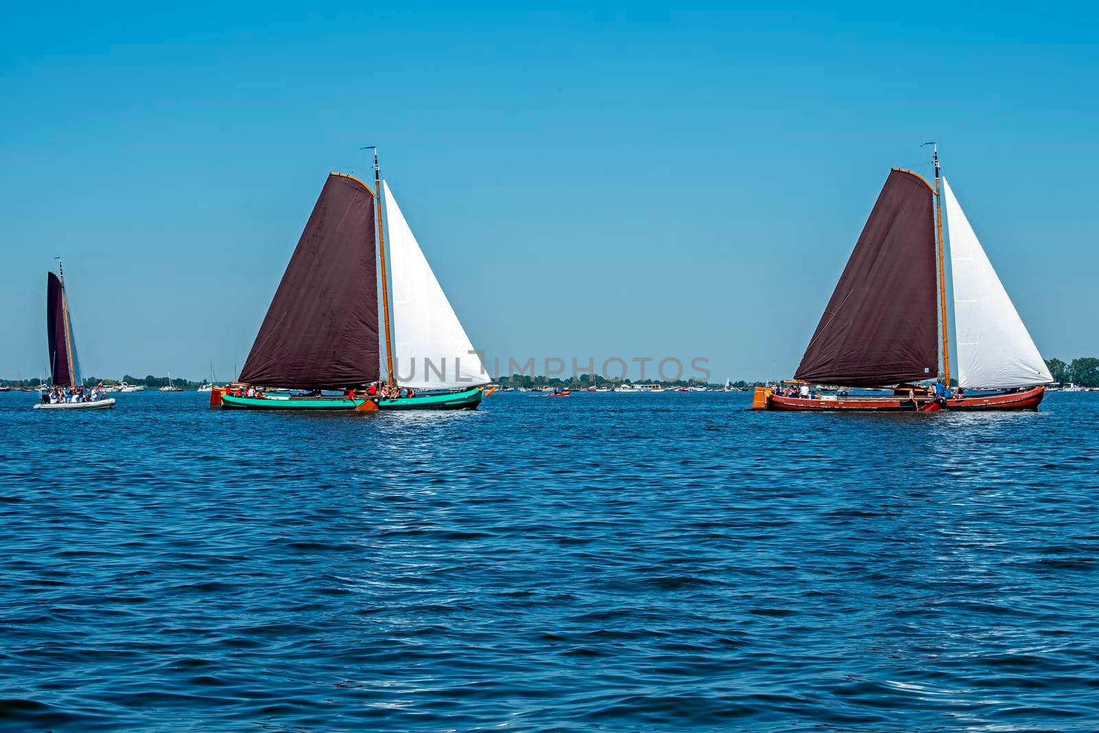 Traditional Frisian wooden sailing ships in a yearly competition in the Netherlands