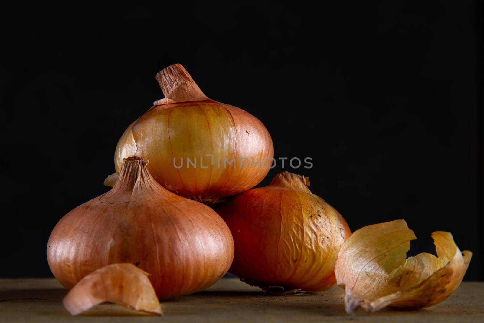 Onions. Vegetables close-up. Bulbs on insulated background. Harvesting on farm.