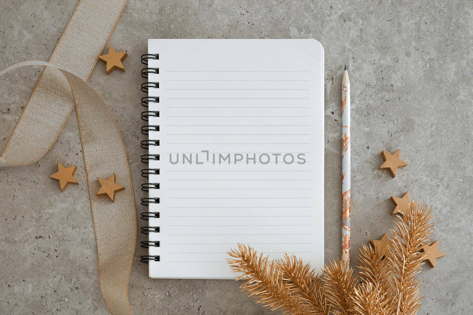Top view of notebook with Christmas decorations. Goals, plans, dreams and to do list for new year. Free space, copy space, mockup or template for your text. by creativebird