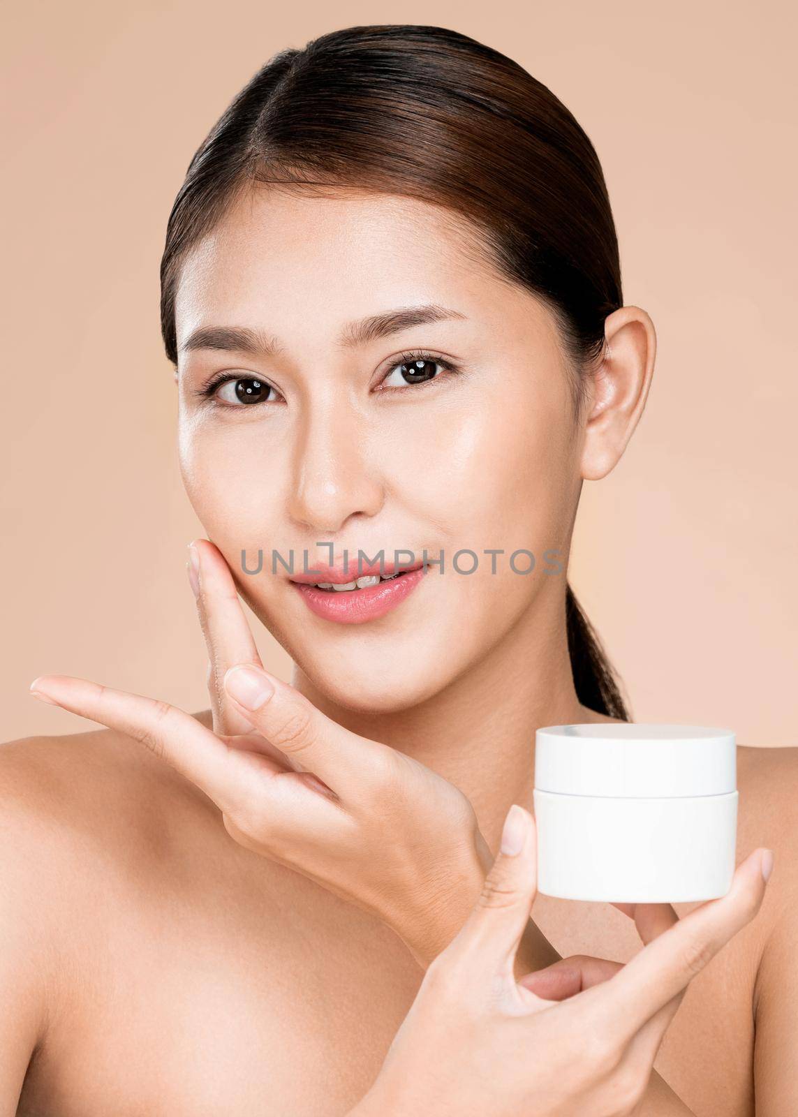 Closeup ardent woman smiling holding mockup product for advertising text place. by biancoblue