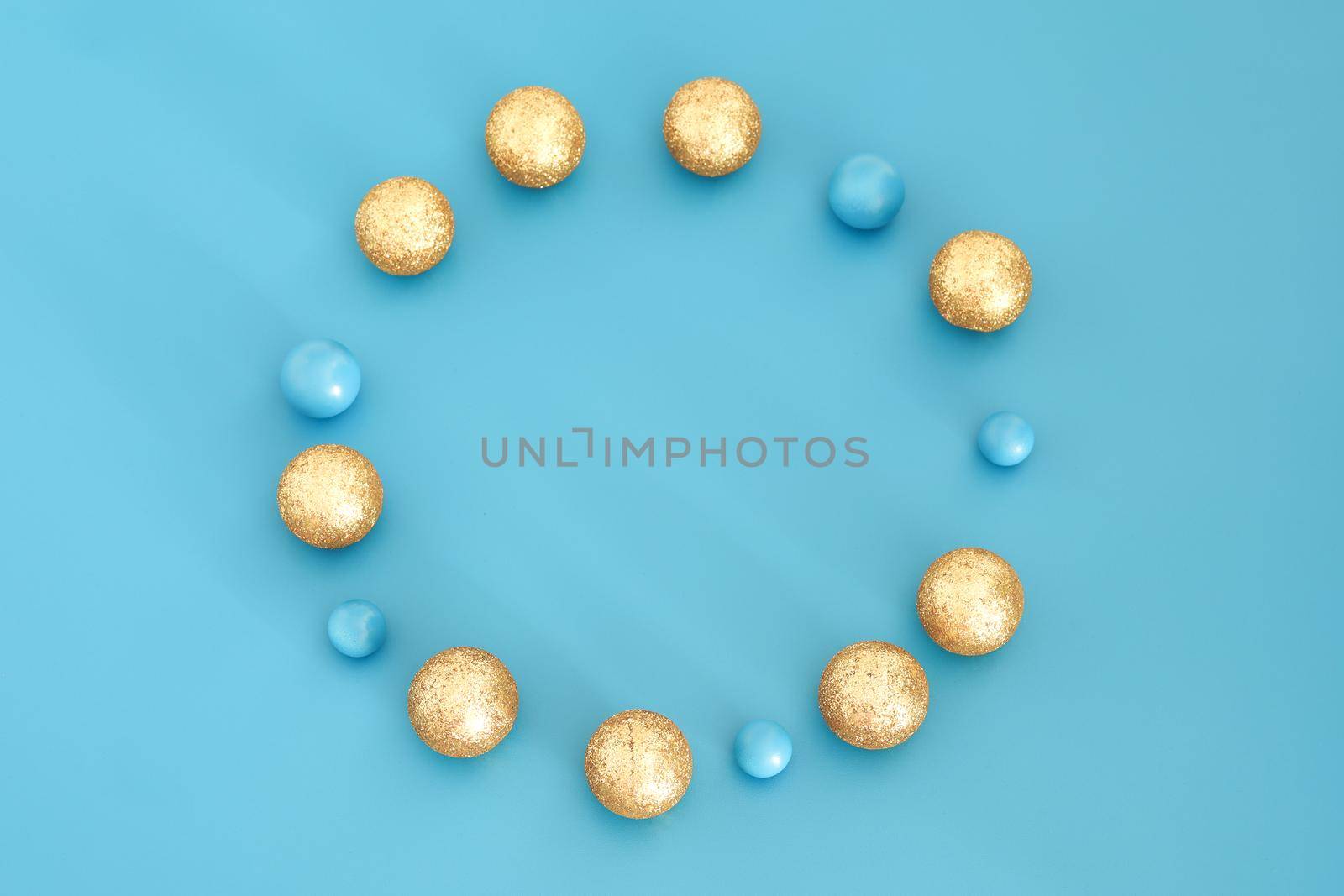 Blue Christmas composition with gold details. Trendy Xmas background, mockup. Modern design. Free space for text, copy space. Flat lay, top view. by creativebird