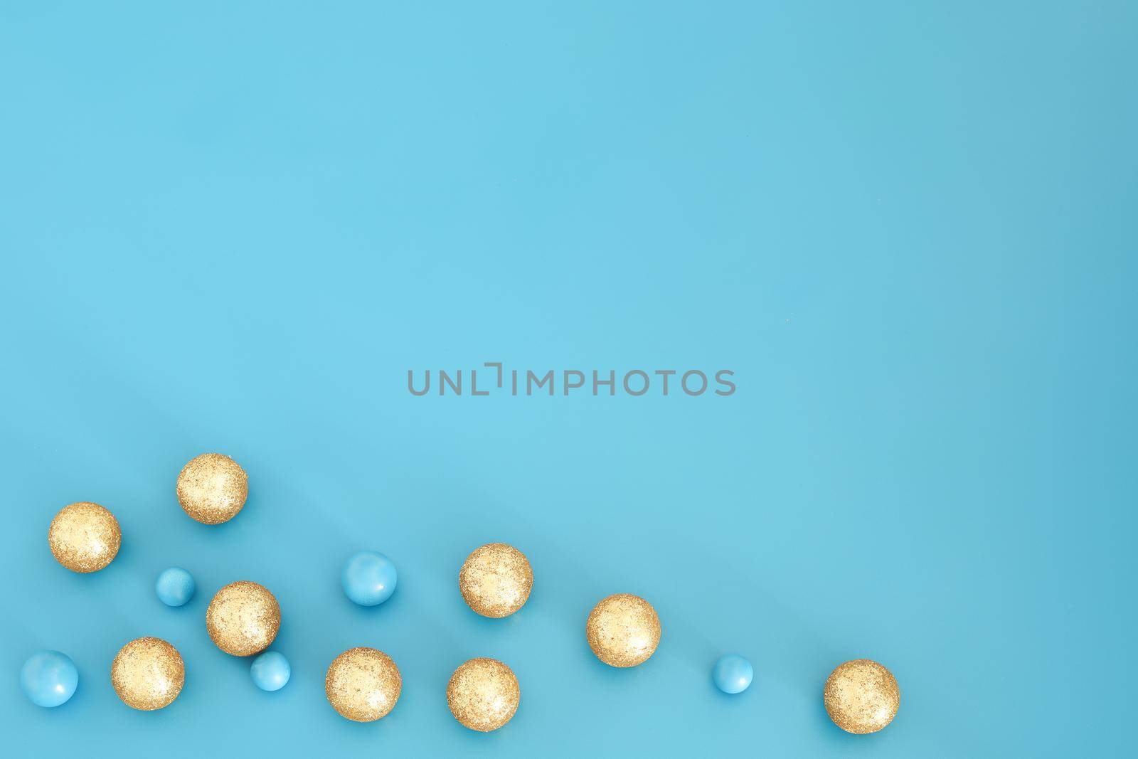 Blue Christmas composition with gold details. Trendy Xmas background, mockup. Modern design. Free space for text, copy space. Flat lay, top view. by creativebird