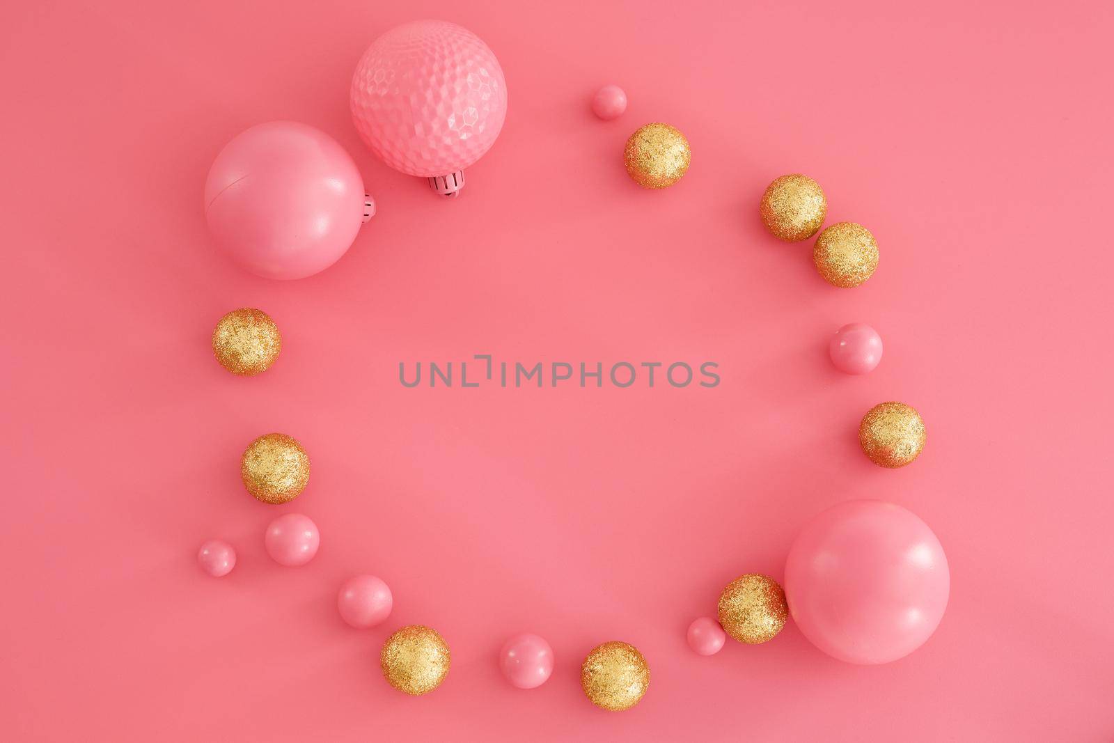 Pink Christmas composition. Trendy Xmas background, mockup. Modern design. Free space for text or logo, copy space. Flat lay, top view