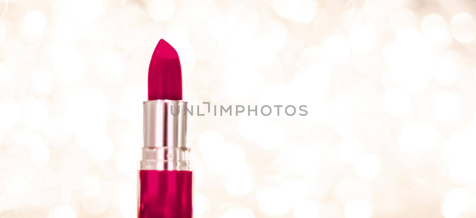 Cosmetic branding, sale and glamour concept - Maroon lipstick on golden Christmas, New Years and Valentines Day holiday glitter background, make-up and cosmetics product for luxury beauty brand