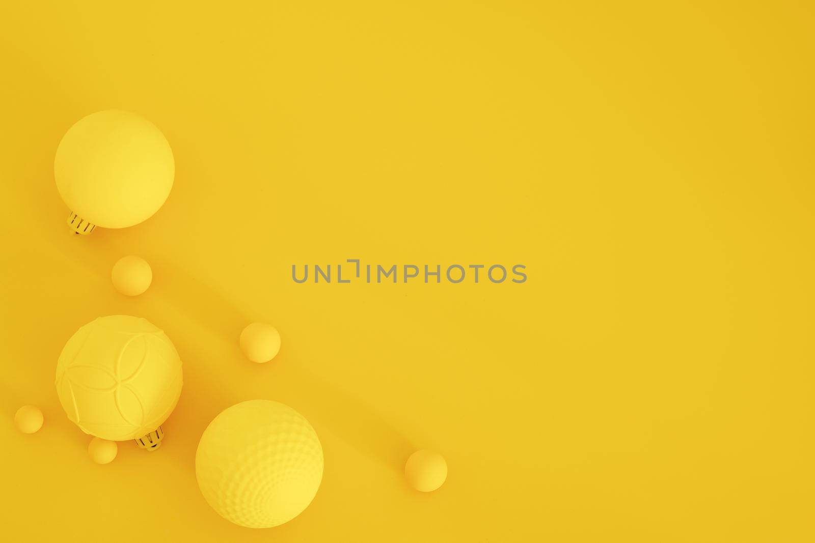 Yellow Christmas composition on the yellow background. Trendy Xmas background, mockup. Modern design. Free space for text, copy space. Flat lay, top view