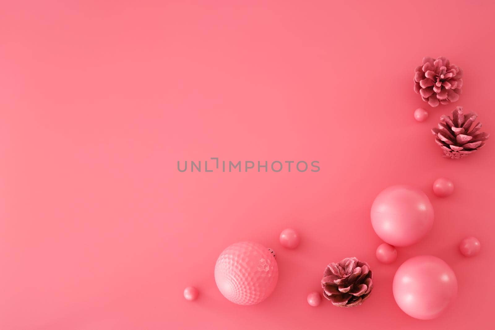 Pink Christmas composition. Trendy Xmas background. Modern design. Free space for text, copy space. Flat lay, top view