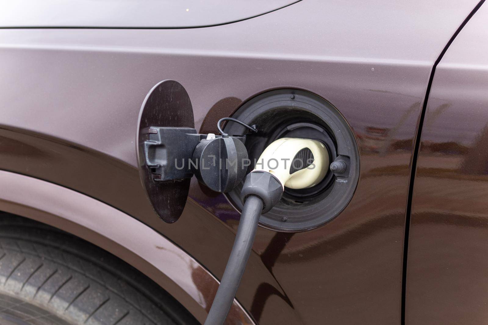 Power supply connect to electric vehicle for charge to the battery. by BY-_-BY