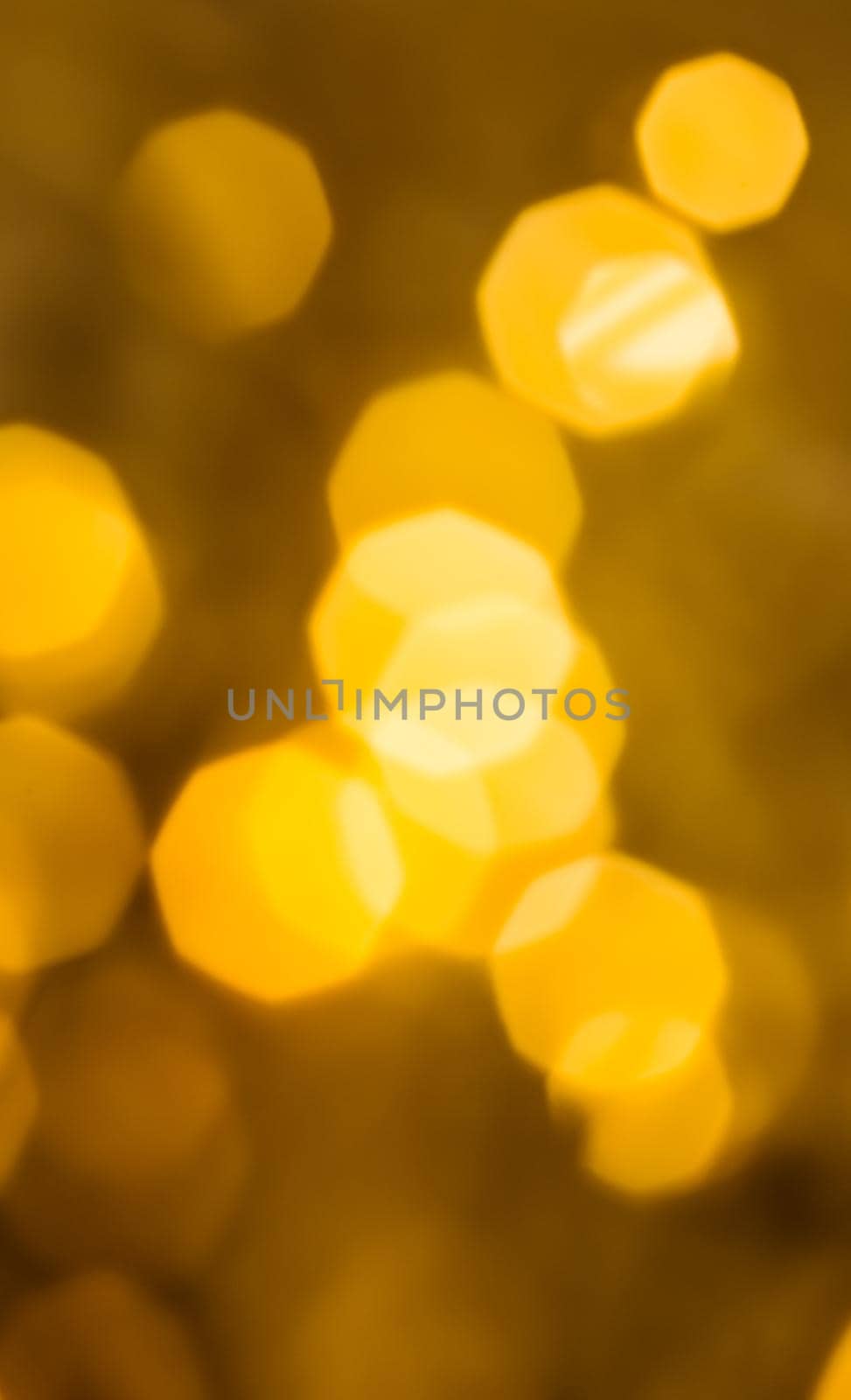 Golden Christmas lights, New Years Eve fireworks and abstract texture concept - Glamorous gold shiny glow and glitter, luxury holiday background