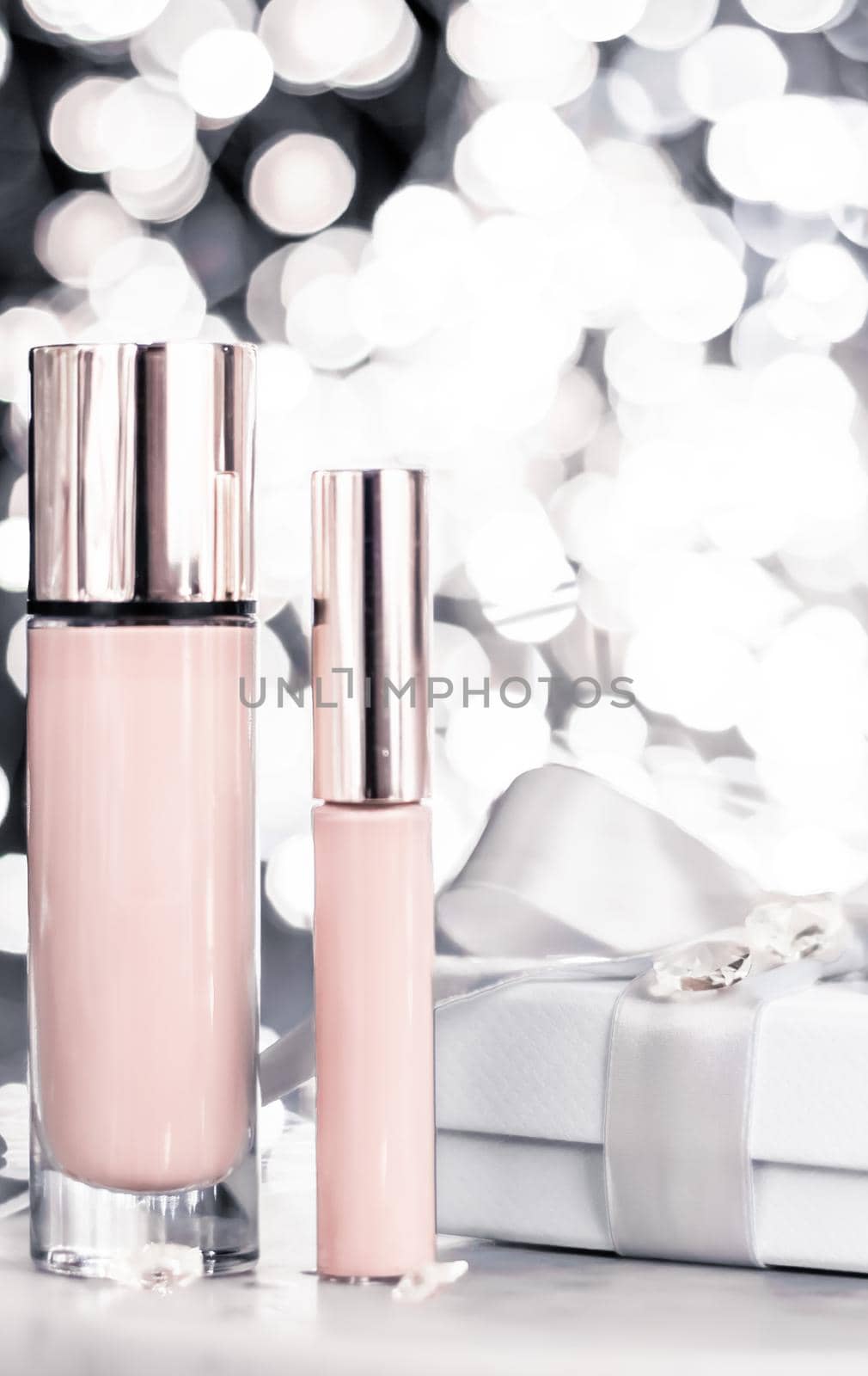 Cosmetic branding, Christmas glitter and girly blog concept - Holiday make-up foundation base, concealer and white gift box, luxury cosmetics present and blank label products for beauty brand design