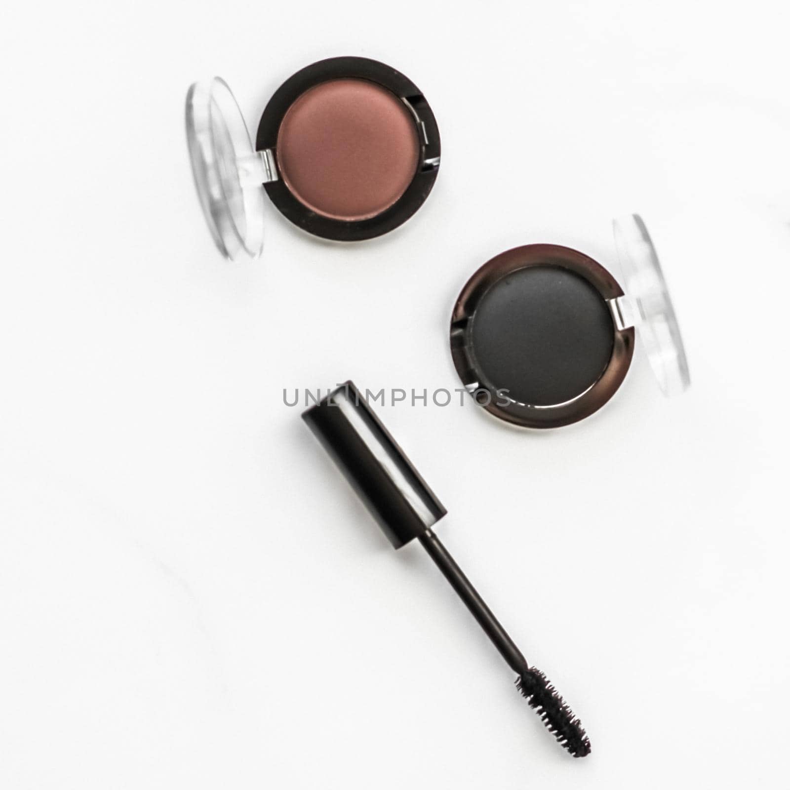 Cosmetic branding, blog and girly concept - Eyeshadows, black liner and mascara on marble background, eye shadows cosmetics as glamour make-up products for luxury beauty brand, holiday flatlay design