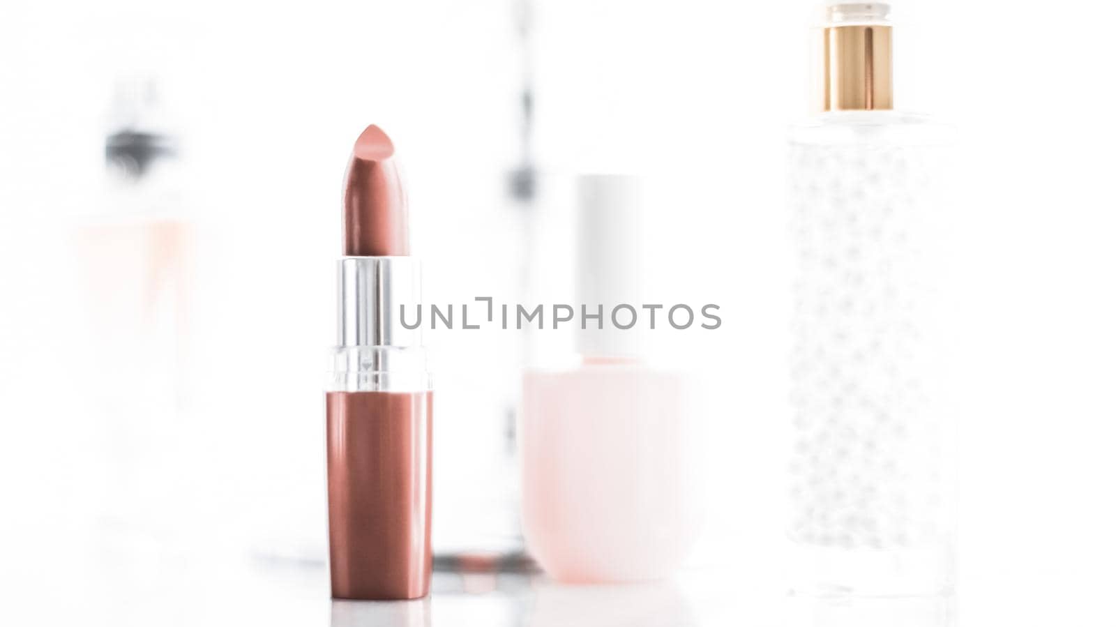 Cosmetic branding, girly and glamour concept - Cosmetics, makeup products on dressing vanity table, lipstick, foundation base, nailpolish and eyeshadows for luxury beauty and fashion brand ads design