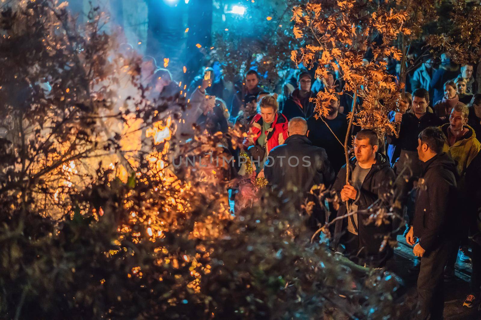 Montenegro, Budva 7.01. 2021: Christian Christmas in Montenegro, the feast of the oak branch. People burn an oak branch in honor of Christmas by galitskaya