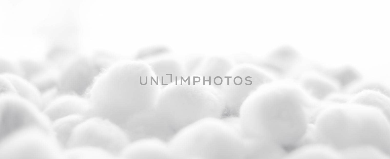Organic cotton balls background for morning routine, spa cosmetics, hygiene and natural skincare beauty brand product as healthcare and medical design by Anneleven