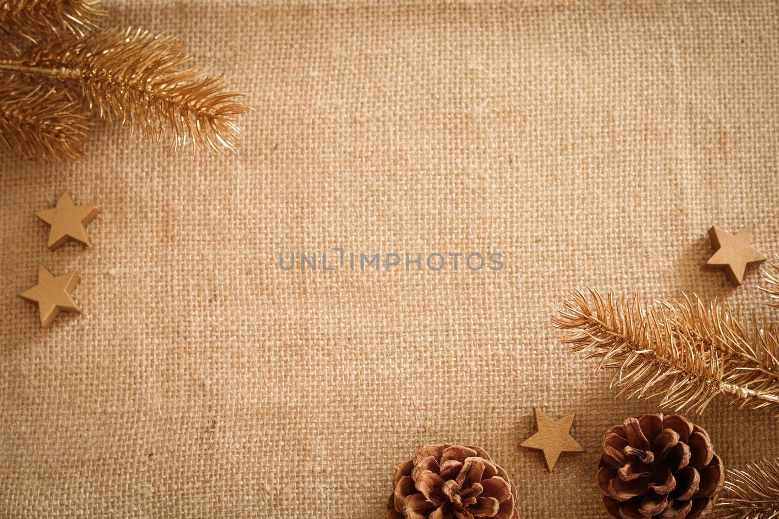 Christmas composition with natural colors and materials. Xmas background, mockup. Decoration elements, pine cones. Free space for text, copy space. Flat lay, top view. by creativebird